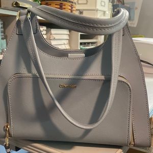Light blue Calvin Klein purse.